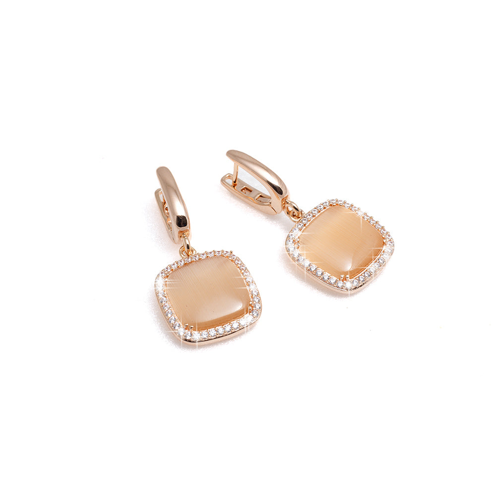 Orecchini Madi Luce in argento rosato con pavé di zirconi